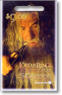 stamp booklet cover: Gandalf (Ian McKellen) examining the One Ring